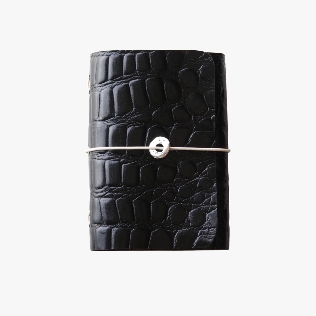 Ivory Carbó · Refillable Leather Case